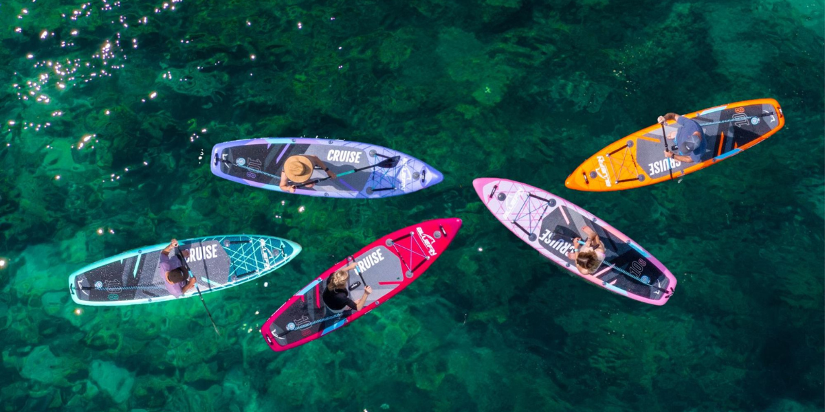 paddleboards on water
