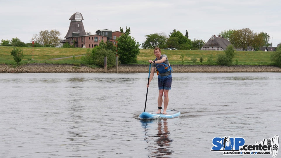 man paddleboarding on a Bluefin Cruise