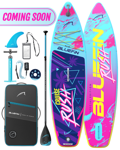 Inflatable paddleboard with colorful design, paddle, fin, pump, and carrying bag for travel.