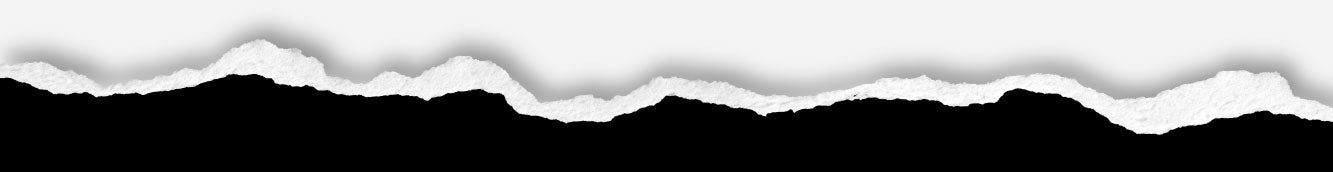 Mountain range silhouette with jagged peaks against a light background, creating a dramatic contrast.