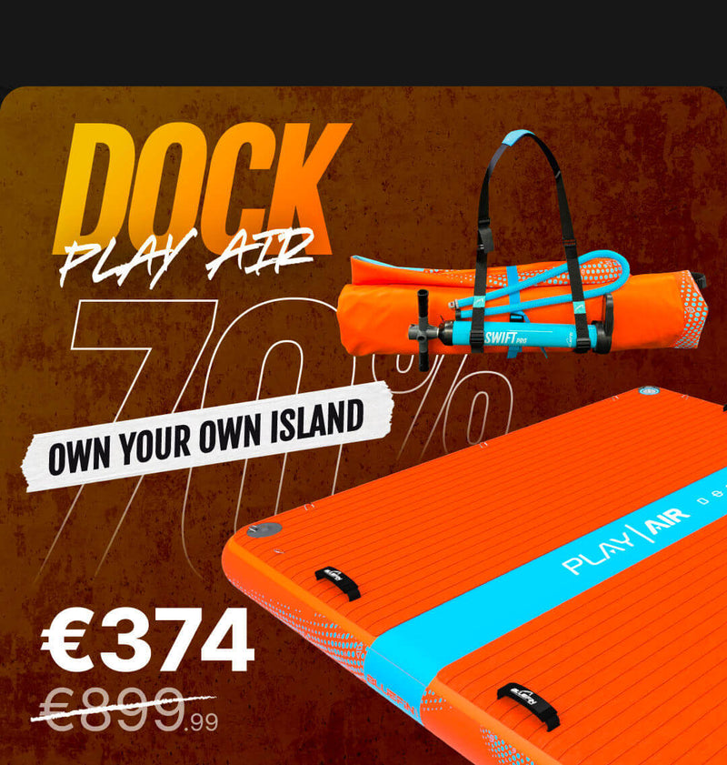 Orange inflatable dock with textured surface, carrying strap, and price tag showing €374
